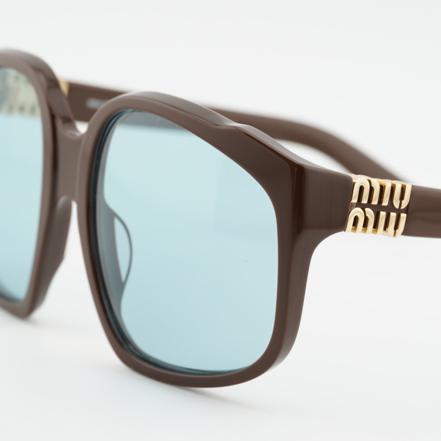 Lentes de Sol Miu Miu MUA07S 24D20R 59-19-140