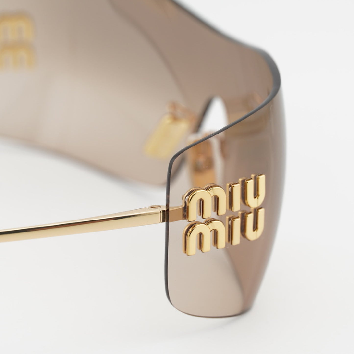 Lentes de Sol Miu Miu MUB53S 5AK20P