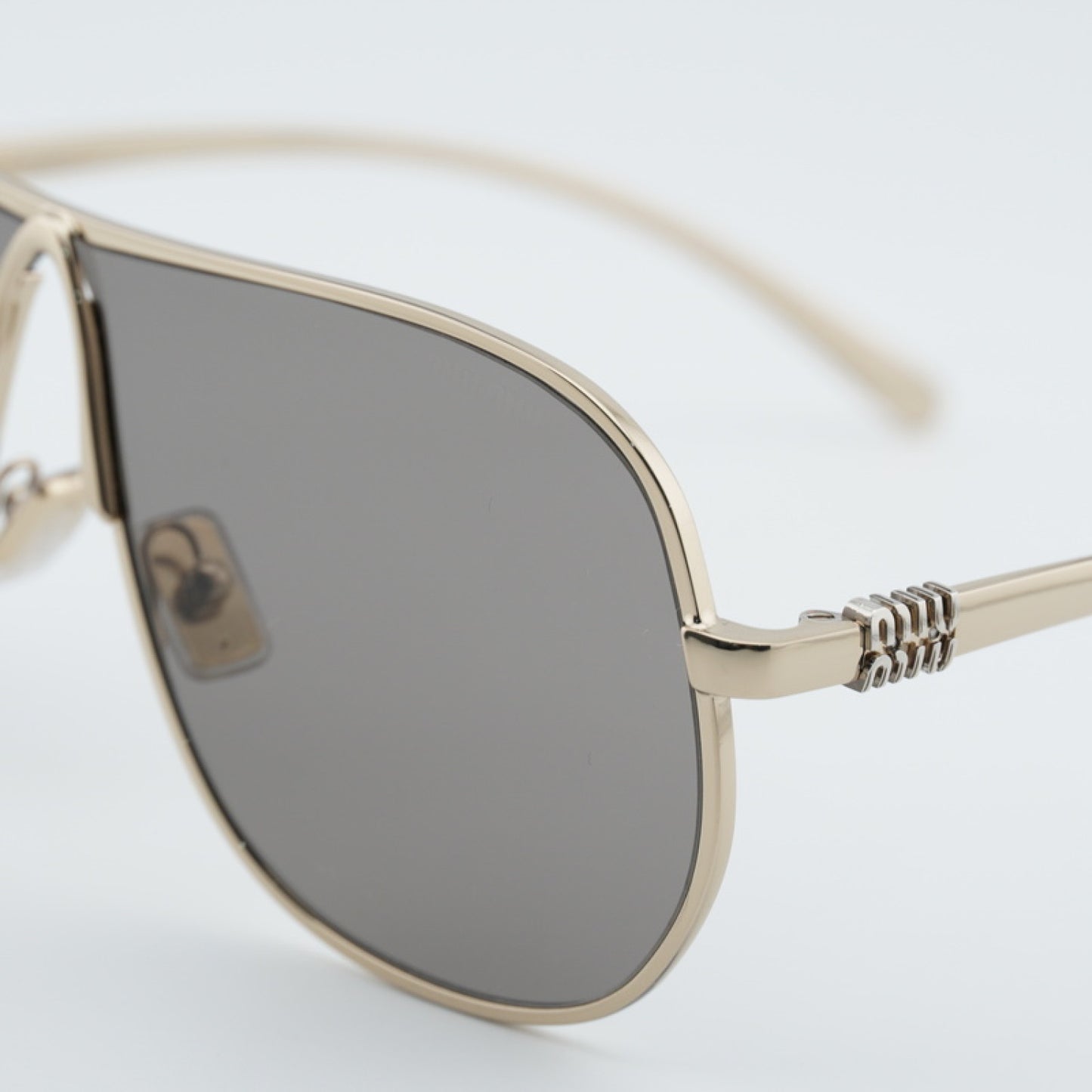 Lentes de Sol Miu Miu MUA56S ZVN80Q 66-02-140