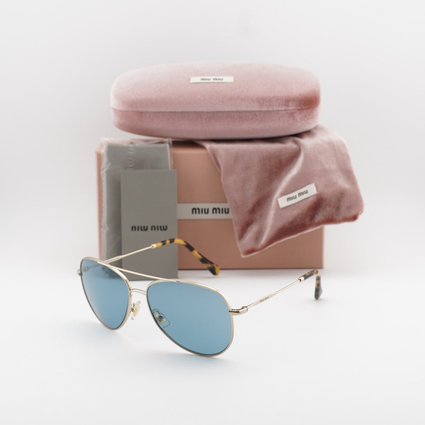 Lentes de Sol Miu Miu MU61US ZVN6P2 57-17-140