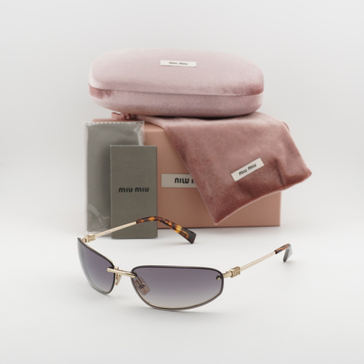 Lentes de Sol Miu Miu MUA50S ZVN30C 68-15-130