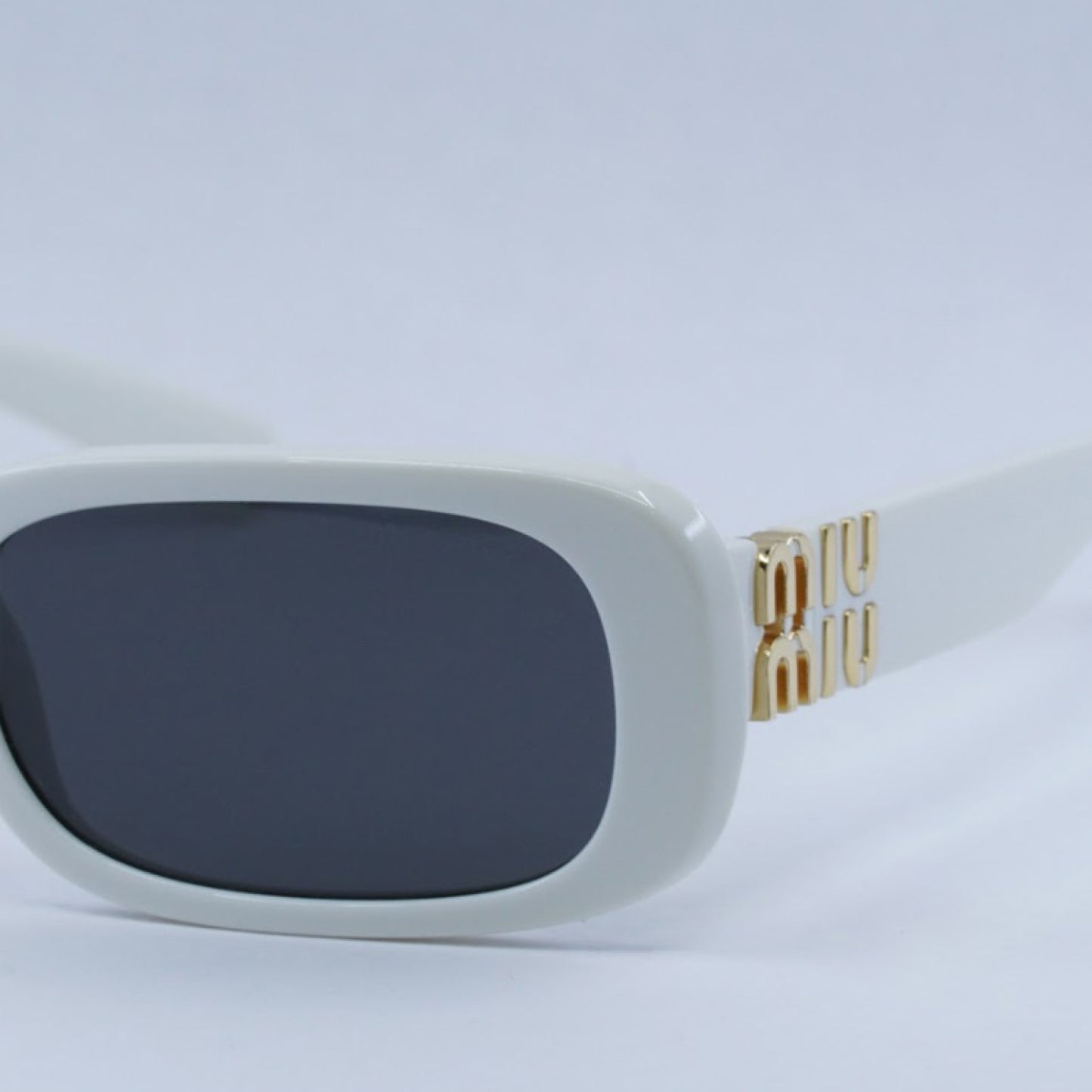 Lentes de Sol Miu Miu MU08ZS 1425S0 53-20-140