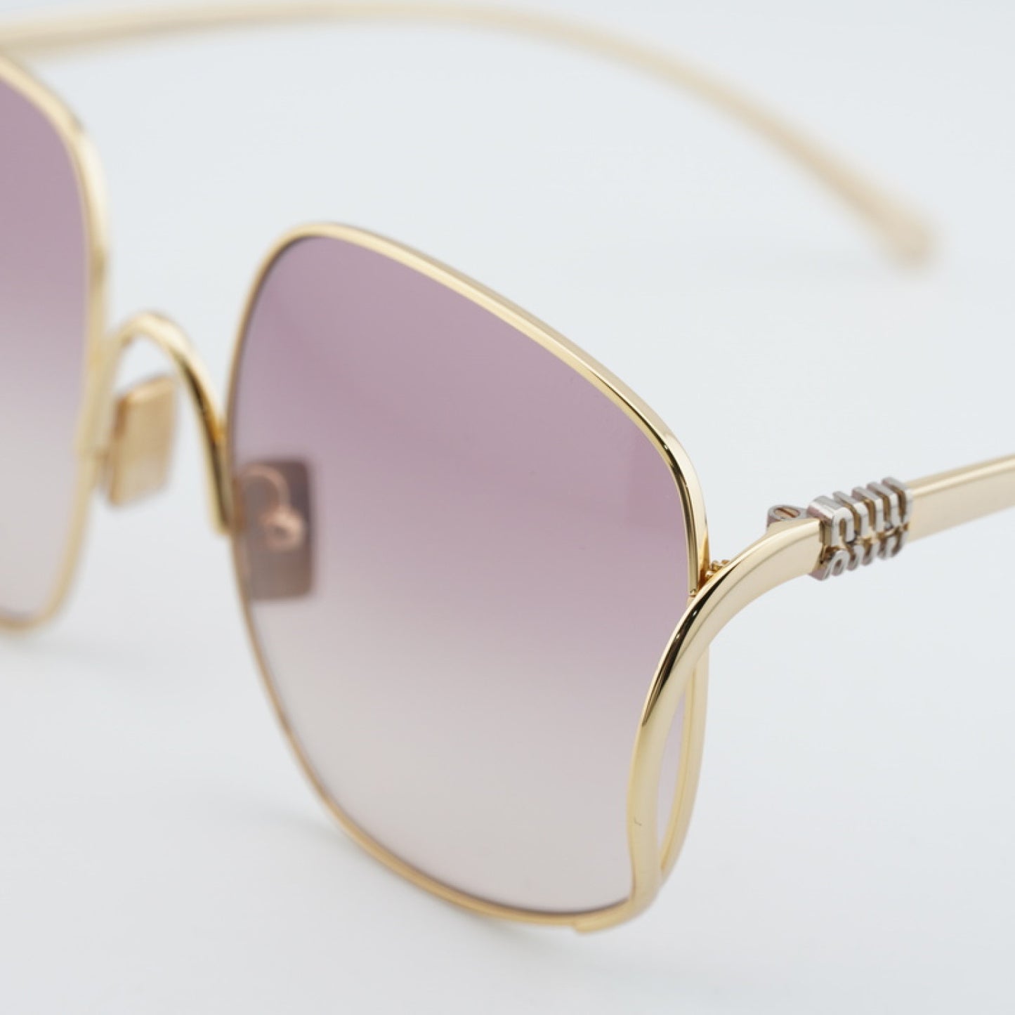 Lentes de Sol Miu Miu MUA57S 5AK40S 57-20-140