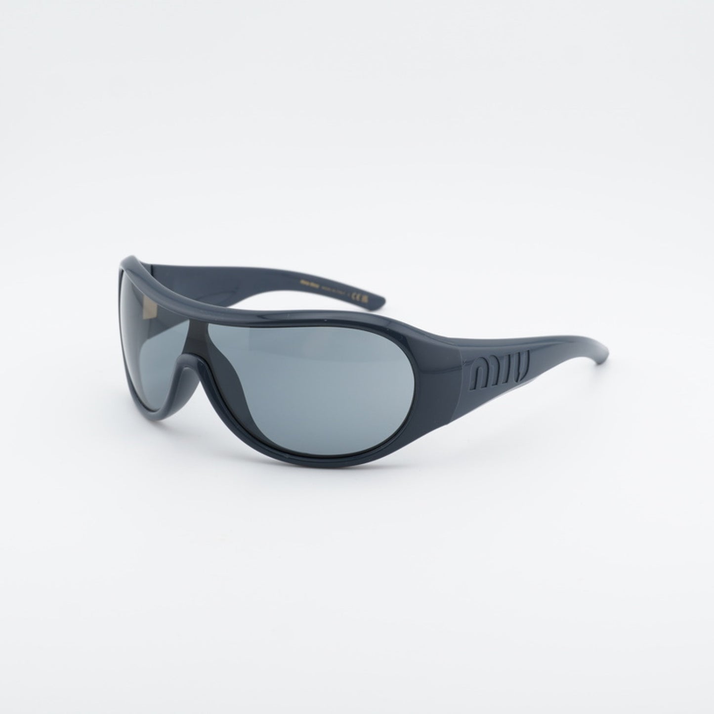 Lentes de Sol Miu Miu MU B14SU 25N70M
