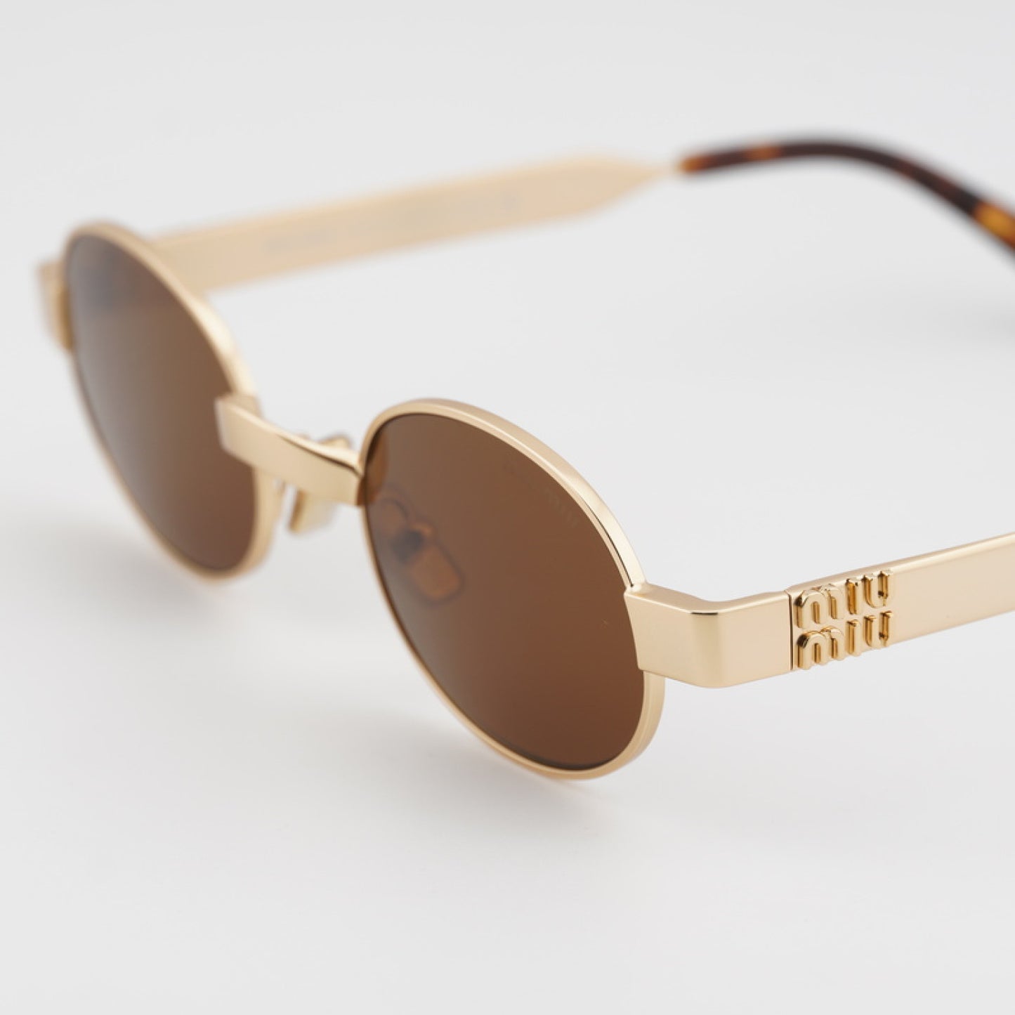 Lentes de Sol Miu Miu MUB51S 22M20V 47-21-135