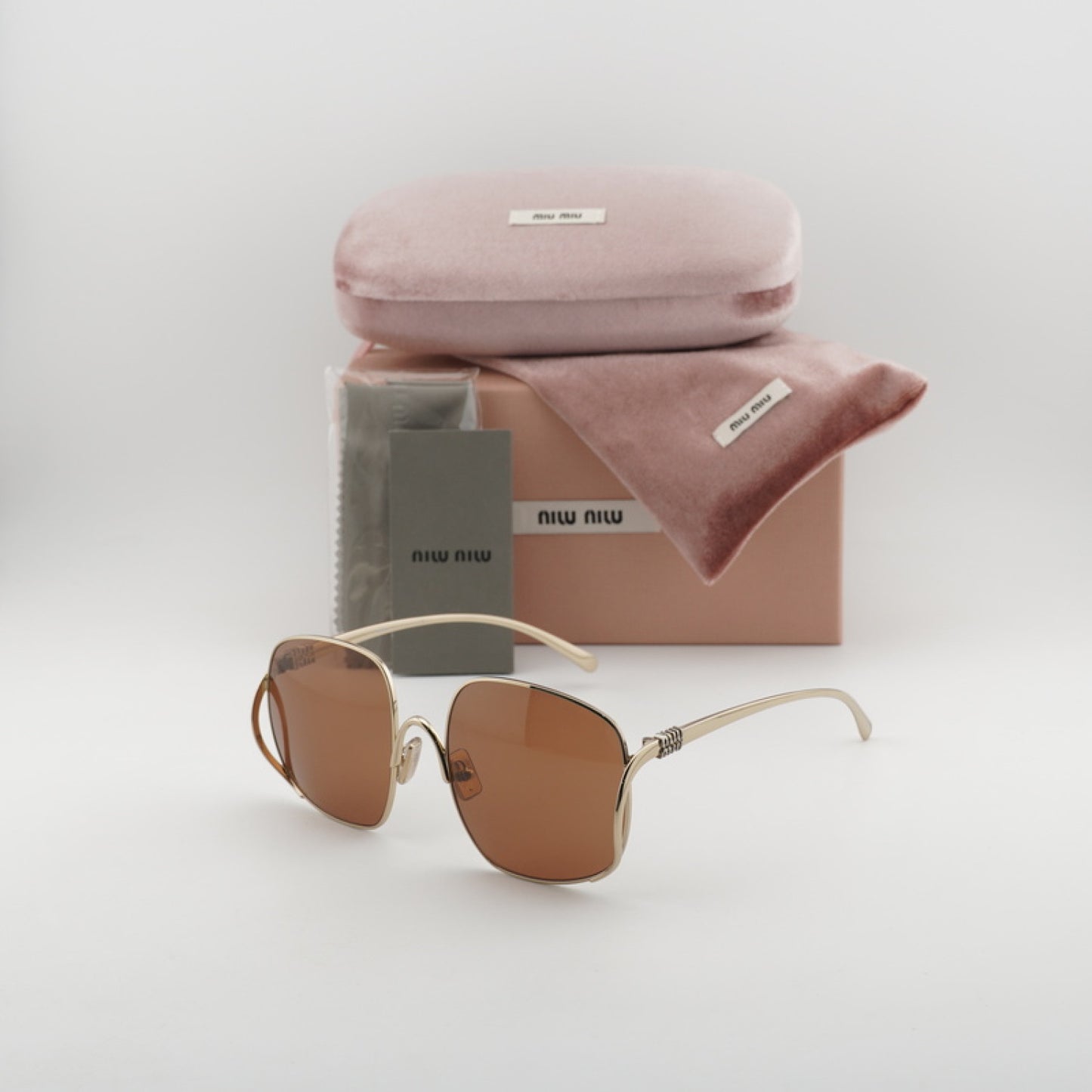 Lentes de Sol Miu Miu MUA57S ZVN90Q 57-20-140
